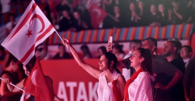 Supporters wave flags at the launch of TRNC President Ersin Tatar&#039;s “Vision: Offensive Diplomacy” campaign, Lefkoşa (Nicosia), TRNC, Sept. 24. (AA Photo)