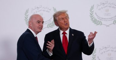 U.S. President Donald Trump and FIFA president Gianni Infantino pose for a photo, at a world leaders&#039; summit on ending the Gaza war, Sharm el-Sheikh, Egypt, Oct. 13, 2025. (Reuters Photo)