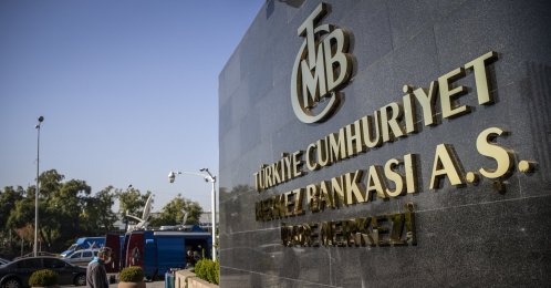 A man passes by the headquarters of the Central Bank of the Republic of Türkiye (CBRT), Ankara, Türkiye, Oct. 28, 2021. (AA File Photo)