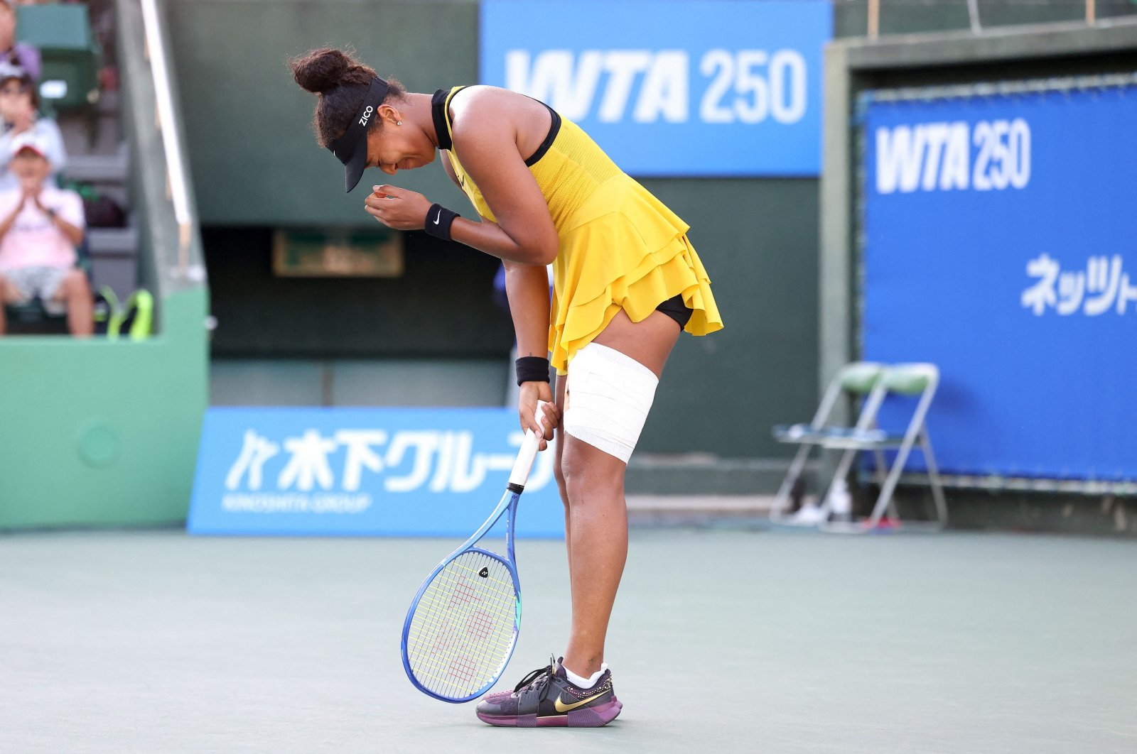 Naomi Osaka overcomes injury, emotion to reach Japan Open quarters