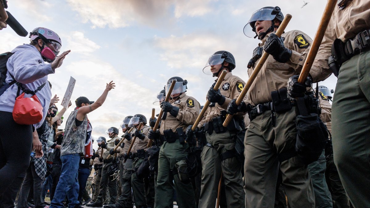 Illinois State police confront protesters during a demonstration outside a U.S. Immigration and Customs Enforcement (ICE) detention facility in Broadview, Illinois, U.S., Oct. 11, 2025. (EPA Photo)