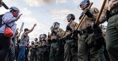 Illinois State police confront protesters during a demonstration outside a U.S. Immigration and Customs Enforcement (ICE) detention facility in Broadview, Illinois, U.S., Oct. 11, 2025. (EPA Photo)