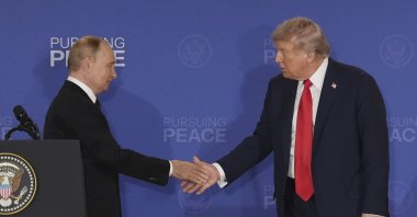 U.S. President Donald Trump (R) shakes the hand of Russia&#039;s President Vladimir Putin during a joint press conference at Joint Base Elmendorf-Richardson, Alaska, U.S., Aug. 15, 2025. (AP Photo)