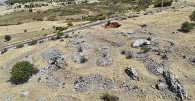 An aerial view of a mountainous area where archaeologists have uncovered grape-processing installations, cisterns, grinding stones, and building foundations dating back to the A.D. fourth century, Adıyaman, southeastern Turkiye, Sept. 4, 2025. (AA Photo)