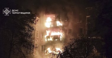 A residential building is seen on fire after a Russian strike in Nizhyn, Chernihiv region, Ukraine, Oct. 16, 2025. (AP Photo)
