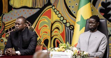 Senegal Prime Minister Ousmane Sonko, Senegal President Bassirou Diomaye Faye, attend a ceremony after receiving the official report on the Thiaroye massacre, at the Presidential Palace in Dakar, Oct. 16, 2025. (AFP Photo)