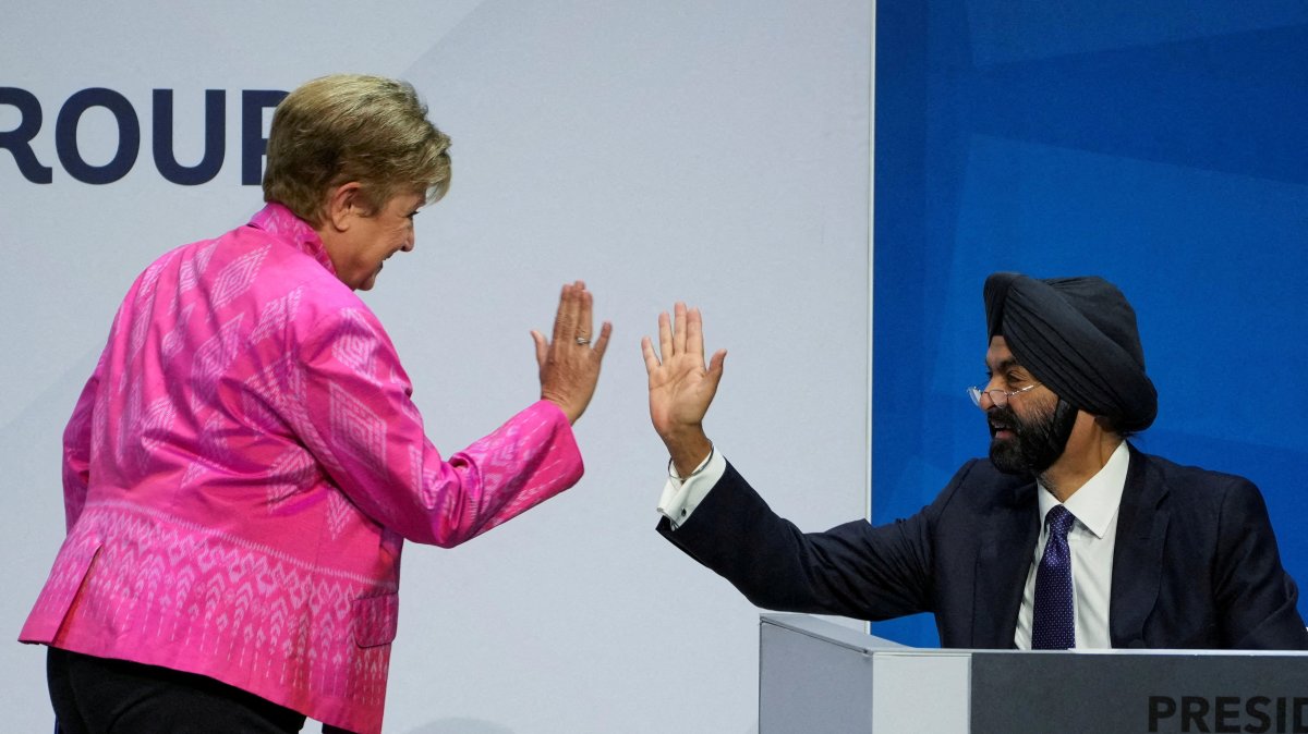 International Monetary Fund (IMF) Managing Director Kristalina Georgieva high-fives World Bank President Ajay Banga during the IMF/World Bank annual meetings in Washington, D.C., U.S., Oct. 17, 2025. (Reuters Photo)