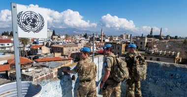 Members of the United Nations Peacekeeping Force in Cyprus stand on a rooftop of an abandoned building while patrolling along the buffer zone, which separates the TRNC and the Greek Cypriot administration, Lefkoşa (Nicosia) on the island of Cyprus, Feb. 21, 2024. (AFP Photo)