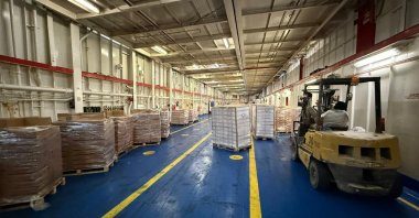 An interior view of the storage area where humanitarian aid from Türkiye’s 17th Ship of Goodness is organized before being sent to Gaza, at the Port of el-Arish Port, Egypt, Oct. 19, 2025. (AA Photo)
