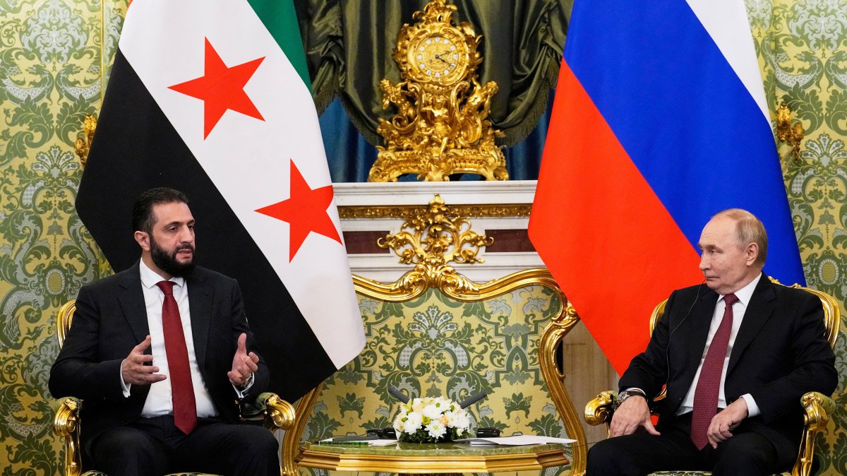 Russian President Vladimir Putin and Syrian interim President Ahmed Al-Sharaa speak during a meeting at the Kremlin, Moscow, Russia, Oct. 15, 2025. (Reuters Photo)