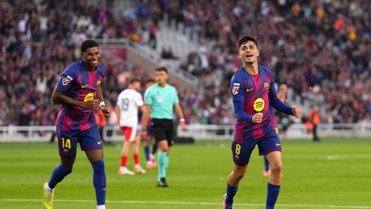 Barcelona&#039;s Pedri (R) celebrates scoring his team&#039;s first goal during the La Liga match against Girona at Estadi Olimpic Lluis Companys, Barcelona, Spain, Oct. 18, 2025. (Getty Images Photo)