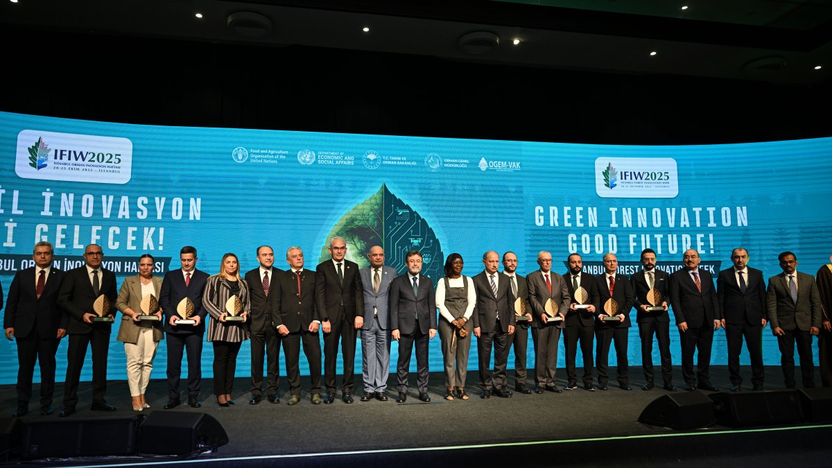 At the conclusion of Istanbul Forest Innovation Week, participants and global communication partners pose for a group photo after receiving their plaques, Istanbul, Türkiye, Oct. 20, 2025. (AA Photo)