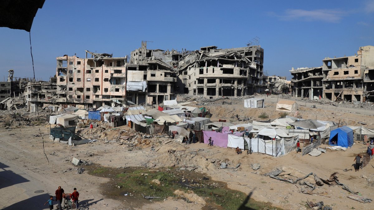 Displaced Palestinians live in tents near destroyed buildings since they cannot return to their houses, Gaza, Palestine, Oct. 19, 2025. (Reuters Photo)