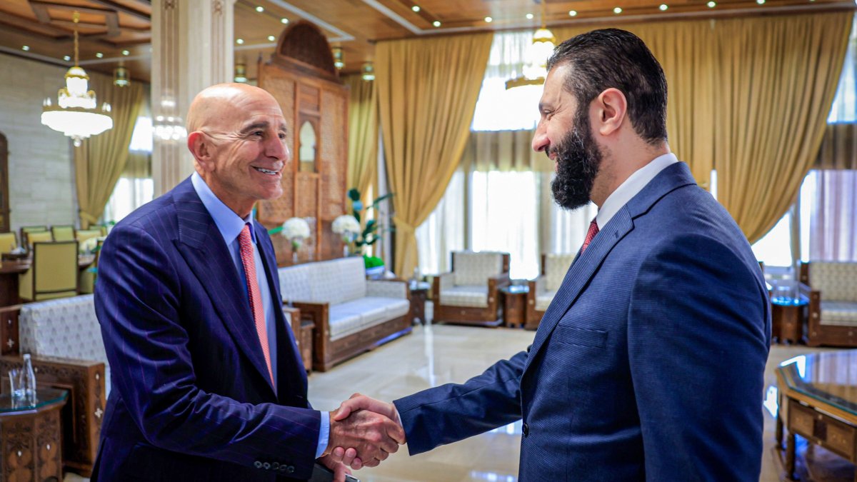 Syria&#039;s interim President Ahmed al-Sharaa (R) meets with U.S. ambassador to Türkiye and special envoy for Syria Tom Barrack (L) in Damascus, Syria, Oct. 7, 2025. (AA Photo)