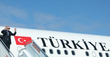 President Recep Tayyip Erdoğan is seen embarking on the presidential plane before flying to Egypt, Ankara, Türkiye, Oct. 13, 2025. (AA Photo)