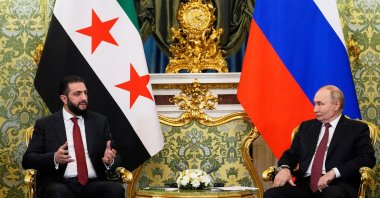 Russian President Vladimir Putin and Syrian interim President Ahmed Al-Sharaa speak during a meeting at the Kremlin, Moscow, Russia, Oct. 15, 2025. (Reuters Photo)