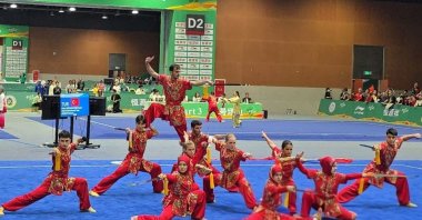Members of the Turkish national wushu team perform a routine during the 10th World Kungfu Championships, Emeishan, China, Oct. 19, 2025. (IHA Photo)
