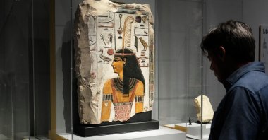 A relief of Maat is displayed in the &quot;Divine Egypt&quot; exhibition, at the Metropolitan Museum of Art, New York, U.S., Oct. 14, 2025. (AP Photo)