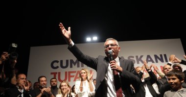 President-elect Tufan Erhürman addresses supporters after the election victory, Lefkoşa (Nicosia), TRNC, Oct. 19, 2025. (EPA Photo)