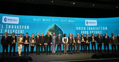 At the conclusion of Istanbul Forest Innovation Week, participants and global communication partners pose for a group photo after receiving their plaques, Istanbul, Türkiye, Oct. 20, 2025. (AA Photo)
