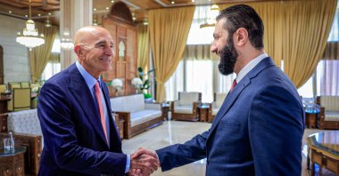 Syria&#039;s interim President Ahmed al-Sharaa (R) meets with U.S. ambassador to Türkiye and special envoy for Syria Tom Barrack (L) in Damascus, Syria, Oct. 7, 2025. (AA Photo)