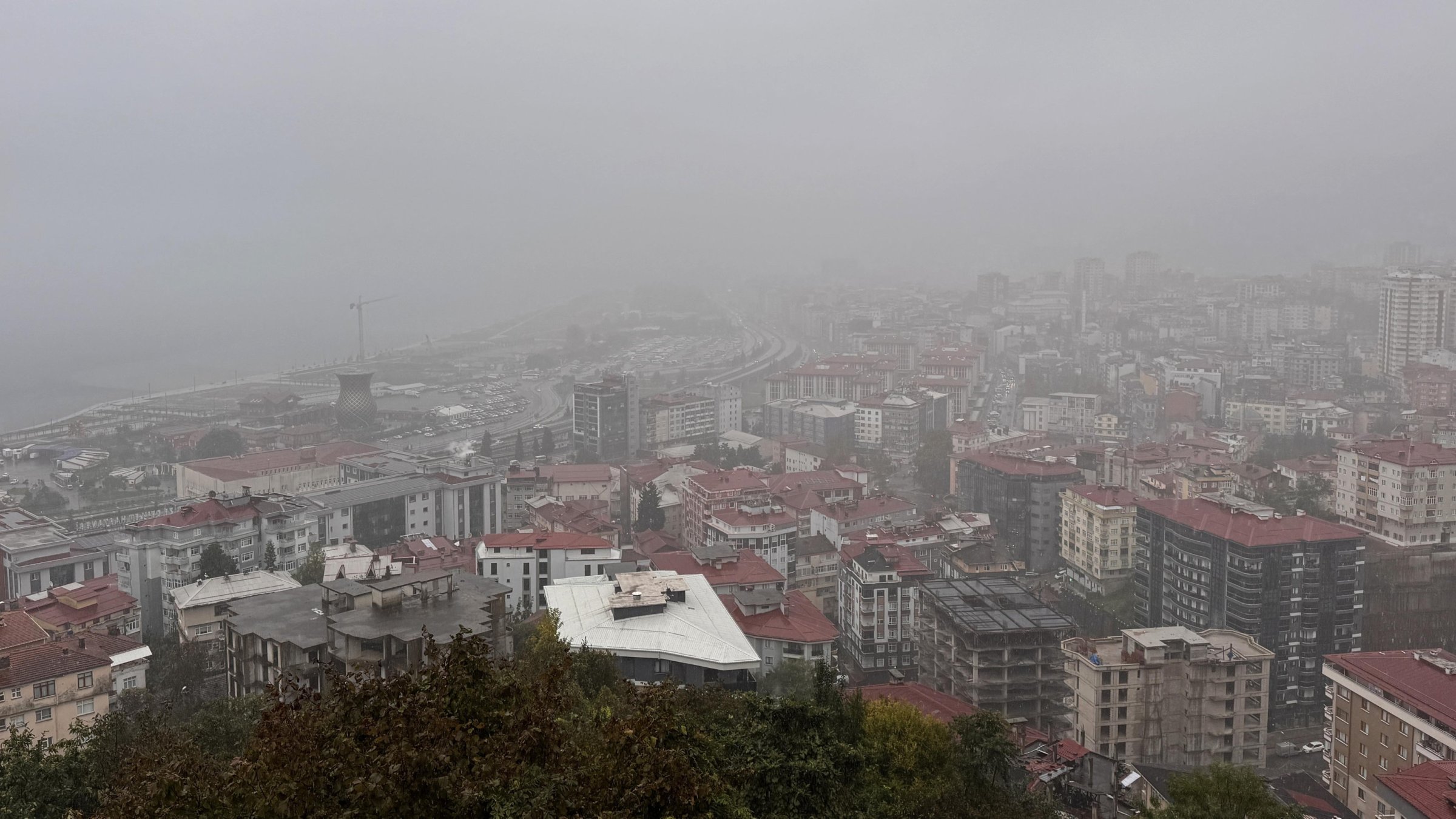 Rain falls over the city’s lush landscape as it is partially shrouded in mist and clouds, Rize, Türkiye, Oct. 20, 2025. (AA Photo)