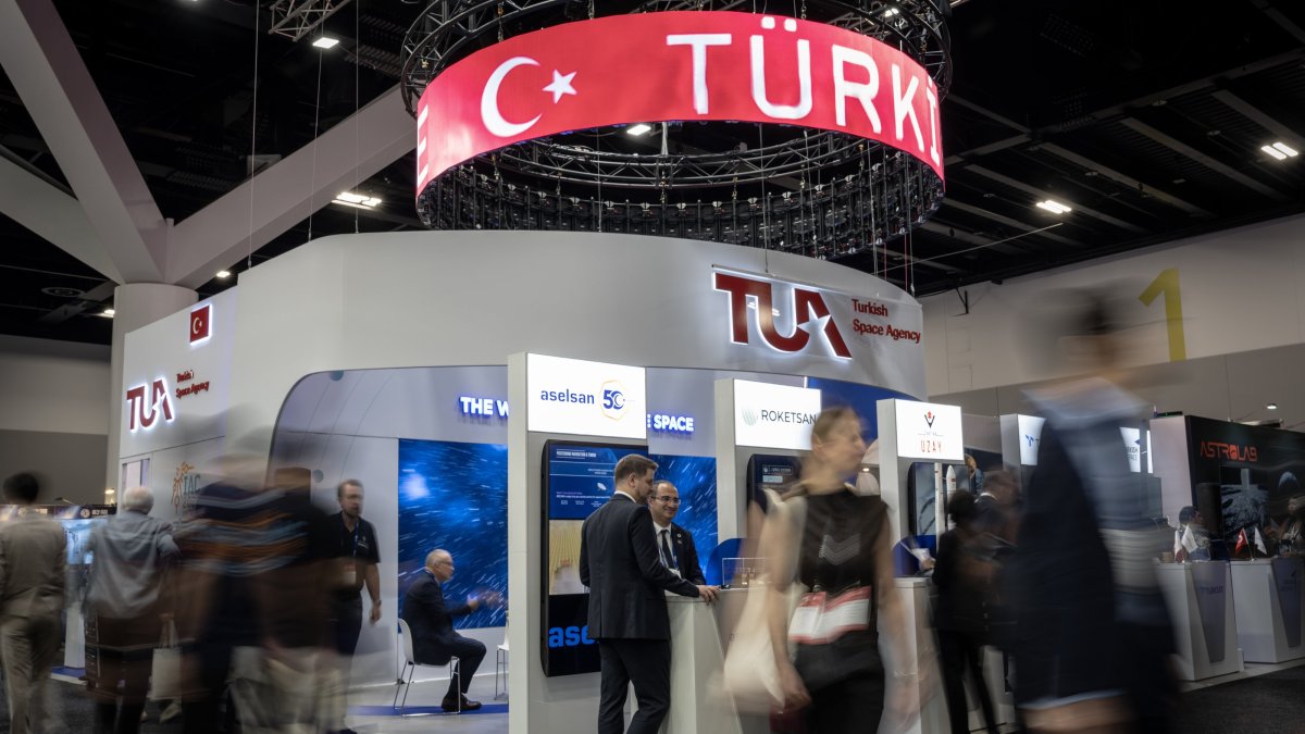A logo of the Turkish Space Agency (TUA) is seen at the Türkiye pavilion during the recent  International Astronautical Congress (IAC) held in Sydney, Australia, Oct. 1, 2025. (AA Photo)