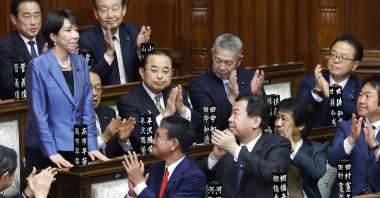 Sanae Takaichi (L) acknowledges her fellow lawmakers after being elected as the new Prime Minister during the general assembly of an extraordinary parliamentary session in Tokyo, Japan, Oct. 21, 2025. (EPA Photo)