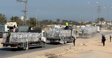 Trucks carry aid for Palestinians, amid a cease-fire between Israel and Hamas in Gaza, in Deir Al-Balah, Gaza Strip, Palestine, Oct. 21, 2025. (Reuters Photo)
