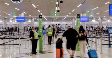 Passengers head to a Transportation Security Administration (TSA) screening checkpoint at Hartsfield-Jackson Atlanta International Airport in Atlanta, Georgia, Oct. 10, 2025. (EPA Photo)