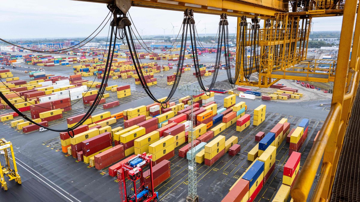 A photo taken from a container bridge shows containers stacked at the overseas port of Bremerhaven, northwestern Germany, Oct. 7, 2025. (AFP Photo)