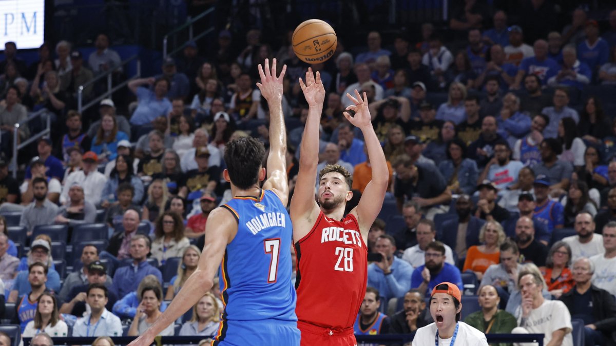 Houston Rockets center Alperen Şengün (28) shoots over Oklahoma City Thunder center Chet Holmgren (7) during the second half at Paycom Center in Oklahoma City, U.S., Oct. 21, 2025. (Alonzo Adams/Imagn Images via Reuters)