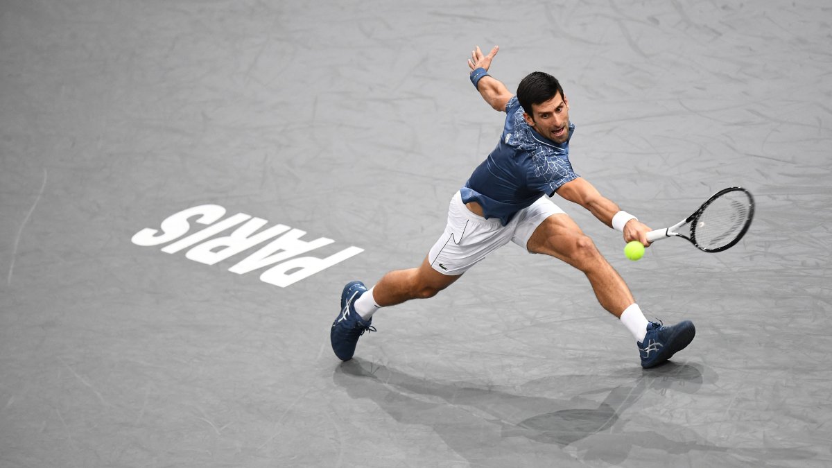 Serbia&#039;s Novak Djokovic returns the ball to Croatia&#039;s Marin Cilic during their men&#039;s singles quarter-final tennis match, Paris, France, Nov. 2, 2018. (AFP Photo)