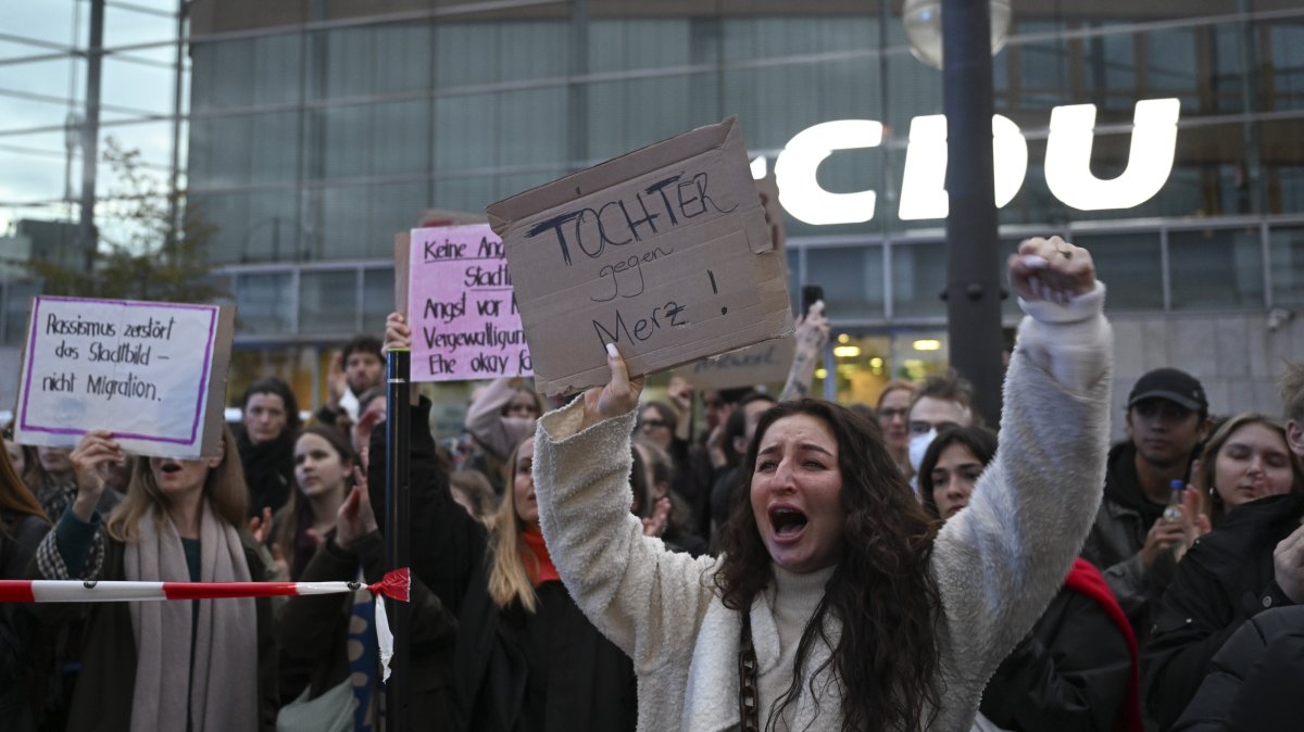 Activists protest Chancellor Friedrich Merz in front of the CDU headquarters in Berlin, Germany, Oct. 20, 2025. (AA Photo)