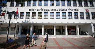 Pedestrians passing by the Ahmet Vefik Pasha Theater, Bursa, Türkiye, Sept. 24, 2025. (AA Photo)
