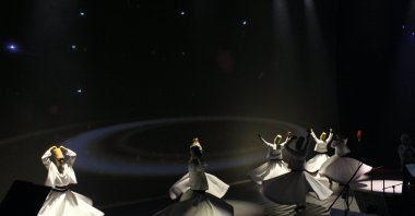 Whirling dervishes perform during &quot;The Voice of a Nation: 90 Years on the Path of Light&quot; at AKM, Istanbul, Türkiye, Oct. 21, 2025. (Courtesy of AKM)