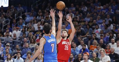 Houston Rockets center Alperen Şengün (28) shoots over Oklahoma City Thunder center Chet Holmgren (7) during the second half at Paycom Center in Oklahoma City, U.S., Oct. 21, 2025. (Alonzo Adams/Imagn Images via Reuters)