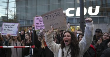 Activists protest Chancellor Friedrich Merz in front of the CDU headquarters in Berlin, Germany, Oct. 20, 2025. (AA Photo)