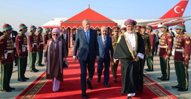 President Recep Tayyip Erdoğan (C) welcomed at the airport by Oman's Sultan Haitham bin Tariq (R), Muscat, Oman, Oct. 22, 2025. (DHA Photo)