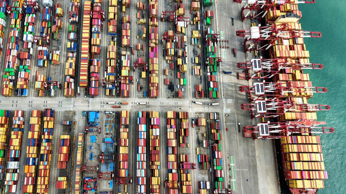 A ship is seen at the container terminal of the port in Qingdao, Shandong province, eastern China, Oct. 9, 2025. (AFP Photo)