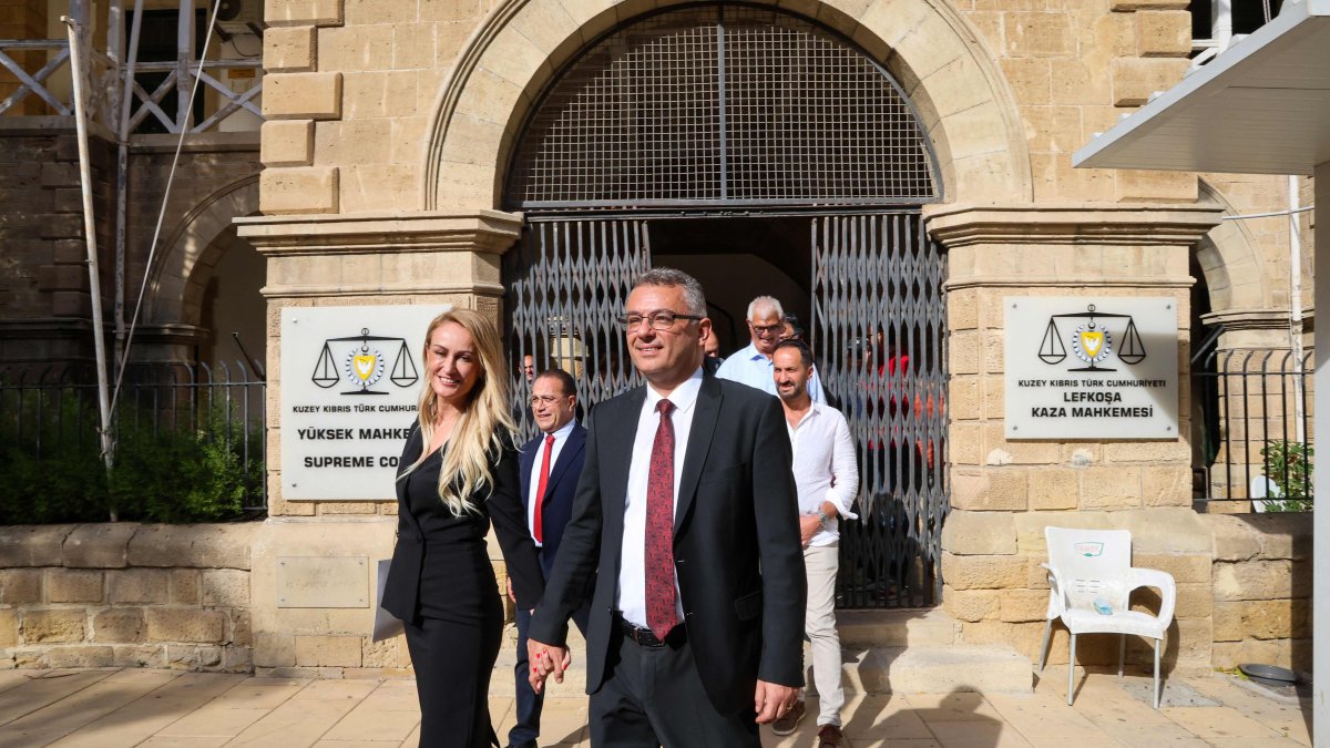 Tufan Erhürman of the Republican Turkish Party (CTP)(R) and his wife Nilden Erhürman leave the Supreme Court building a day after he was elected as the new president, Lefkoşa (Nicosia), TRNC, Oct.19, 2025 (AFP Photo)