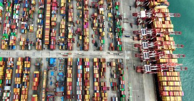 A ship is seen at the container terminal of the port in Qingdao, Shandong province, eastern China, Oct. 9, 2025. (AFP Photo)