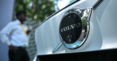 A visitor stands next to Volvo EC 40 electric car during the India Innovation Summit, Bengaluru, India, Oct. 10, 2025. (AFP Photo)