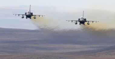 F-16 fighter jets of the Turkish Air Force are seen in the air during a firing exercise in Ankara, Türkiye, Oct. 23, 2025. (AA Photo)