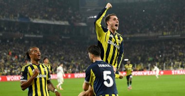 Fenerbahçe&#039;s forward Kerem Aktürkoğlu (top) celebrates with teammates after scoring a goal during the UEFA Europa League football match between Fenerbahçe and Stuttgart at the Chobani Stadium, Istanbul, Türkiye, Oct. 23, 2025. (AFP Photo)