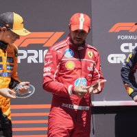 Ferrari driver Lewis Hamilton is flanked on the podium with McLaren driver Oscar Piastri (L) and Red Bull driver Max Verstappen after the sprint race ahead of the Chinese Formula One Grand Prix at the Shanghai International Circuit, Shanghai, China, March 22, 2025. (AP Photo)