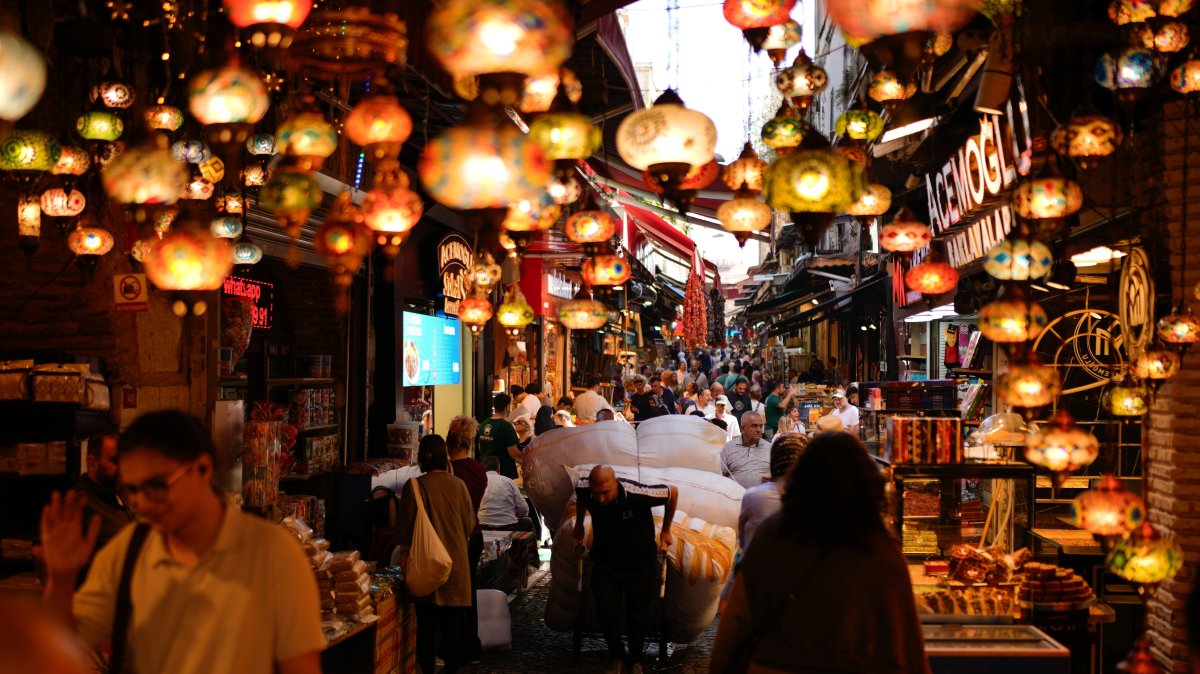A porter pulls a trolley loaded with goods in the popular Eminonu commercial area of Istanbul, Türkiye, Sept. 24, 2025. (AP Photo)