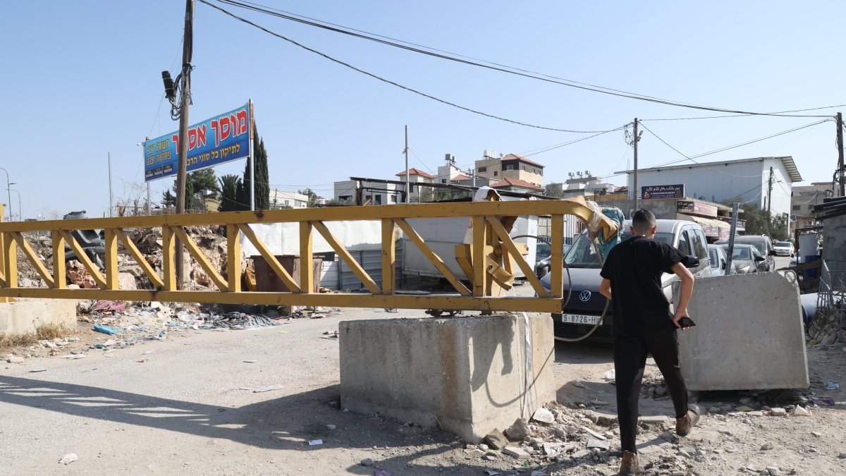 Closed iron gates set up by Israeli forces at the main entrance to Hares village near Salfit city, West Bank, Palestine, Oct. 23, 2025. (EPA Photo)