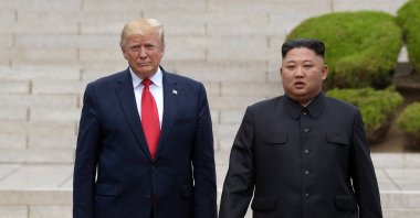 U.S. President Donald Trump (L) meets with North Korean leader Kim Jong Un at the North Korean side of the border at the village of Panmunjom in Demilitarized Zone, June 30, 2019. (AP Photo)