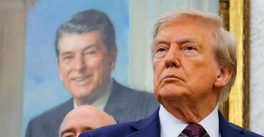 U.S. President Donald Trump, in front of a painting of former U.S. President Ronald Reagan, attends an event in the Oval Office at the White House, Washington, D.C., U.S., Sept. 2, 2025. (Reuters Photo)